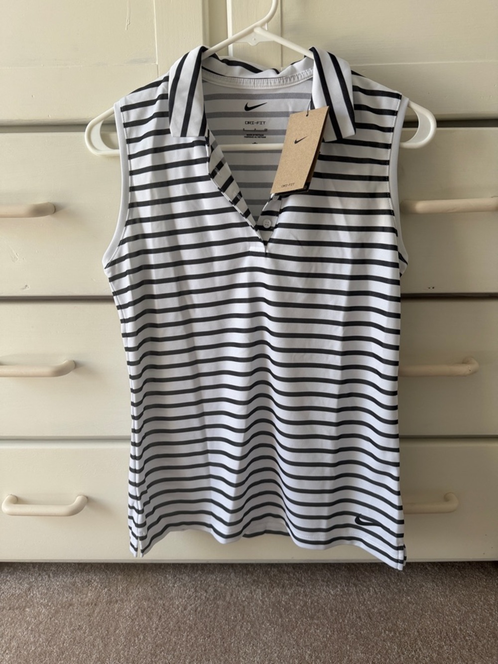 NWT. Nike Women's Black & White Striped Sleeveless Golf Shirt